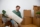 young-man-moving-new-home_23-2149242114